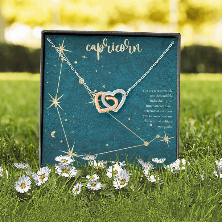 Capricorn | You are a responsible and dependable individual , your inner strenght and determination allow you to overcome any obstacle and achieve you goals. - Interlocking Hearts Necklace