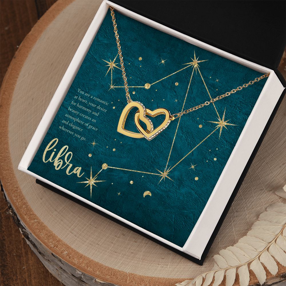 Libra | You are a romantic at heart, your desire for harmony and beauty creates an atmosphere of grace and elegance wherever you go. - Interlocking Hearts Necklace