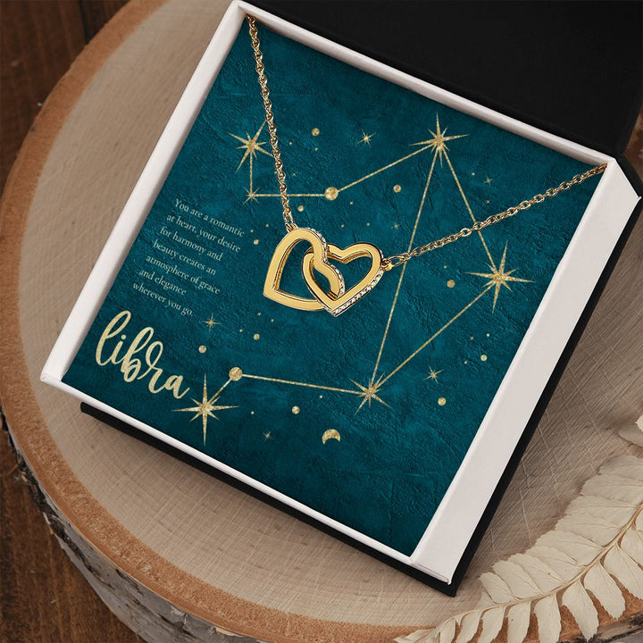 Libra | You are a romantic at heart, your desire for harmony and beauty creates an atmosphere of grace and elegance wherever you go. - Interlocking Hearts Necklace