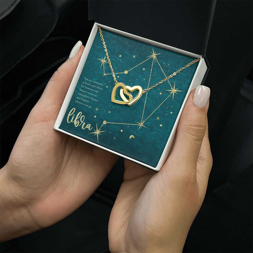 Libra | You are a romantic at heart, your desire for harmony and beauty creates an atmosphere of grace and elegance wherever you go. - Interlocking Hearts Necklace
