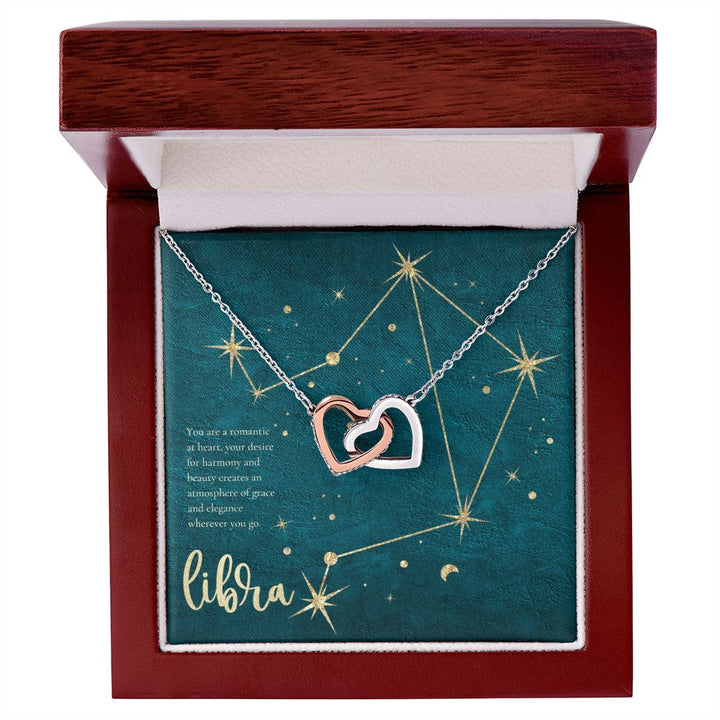 Libra | You are a romantic at heart, your desire for harmony and beauty creates an atmosphere of grace and elegance wherever you go. - Interlocking Hearts Necklace