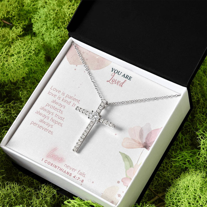 You are Loved | Love Never Fails. 1 Corinthians 4:7-8 - CZ Cross Necklace