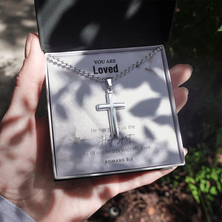 You are Loved | He has given us the Holy Spirit to fill our hearts with His love. Romans 5:5 - Stainless Cross Necklace with Ball Chain