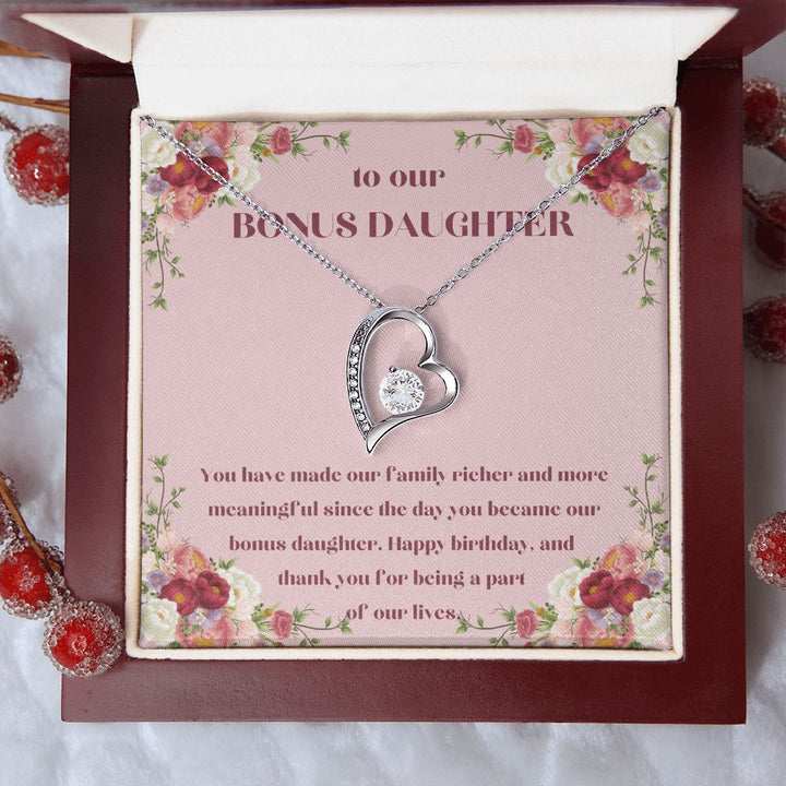 To our Bonus Daughter | You have made our family richer and more meaningful since the day you became our bonus daughter, Happy Birthday! - Forever Love Necklace