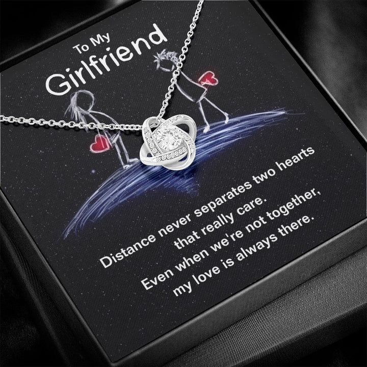 To My Girlfriend | Distance never separates two hearts that really care. - Love Knot Necklace