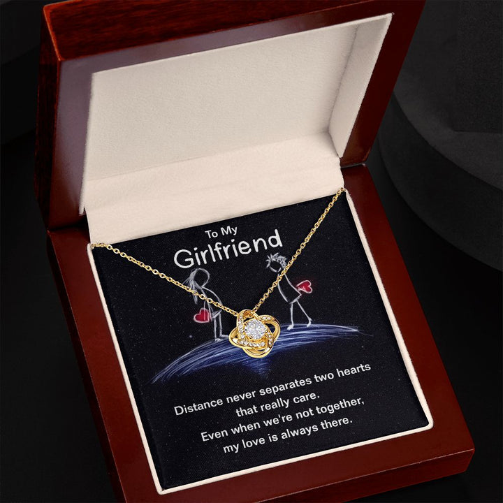 To My Girlfriend | Distance never separates two hearts that really care. - Love Knot Necklace