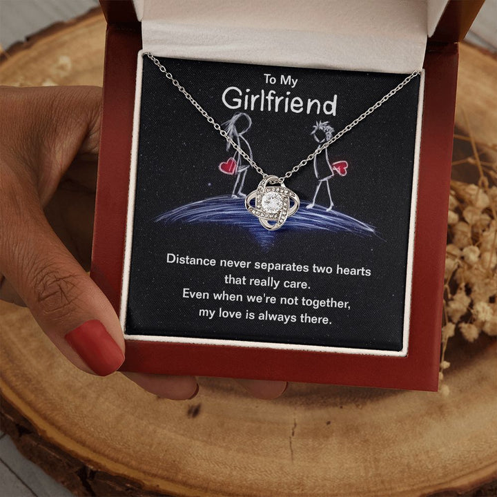 To My Girlfriend | Distance never separates two hearts that really care. - Love Knot Necklace