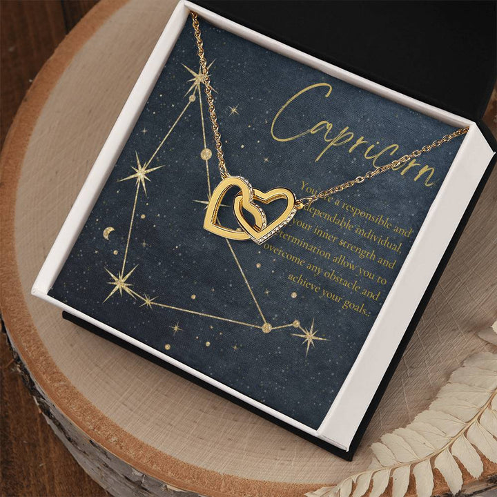 Capricorn | You are a responsible and dependable individual , your inner strength and determination allow you to overcome any obstacle and achieve you goals. - Interlocking Hearts Necklace