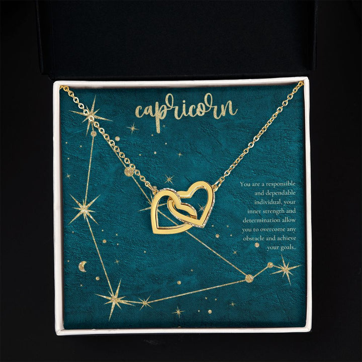 Capricorn | You are a responsible and dependable individual , your inner strenght and determination allow you to overcome any obstacle and achieve you goals. - Interlocking Hearts Necklace