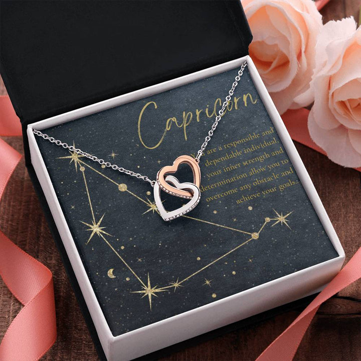 Capricorn | You are a responsible and dependable individual , your inner strength and determination allow you to overcome any obstacle and achieve you goals. - Interlocking Hearts Necklace