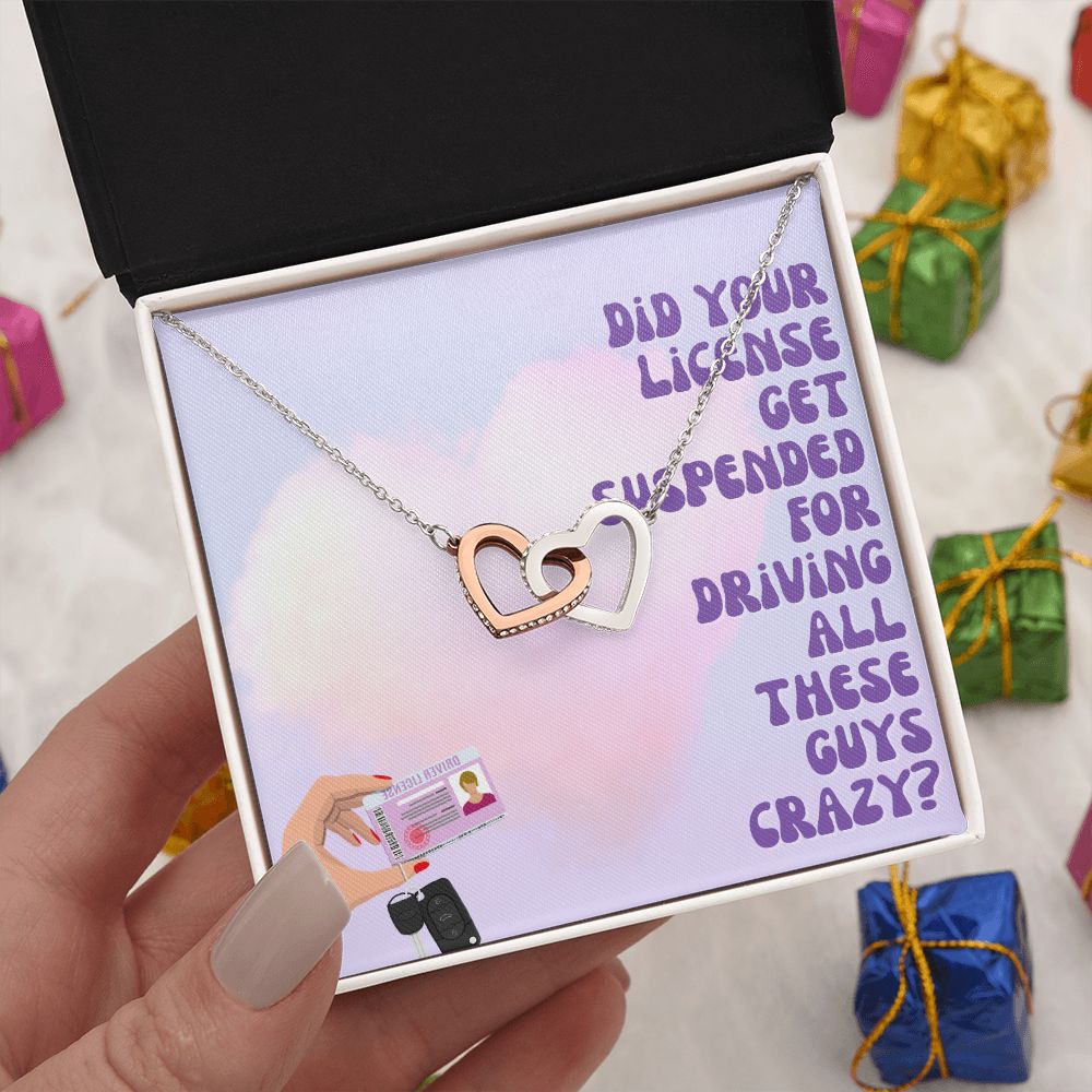 Did your license get suspended for driving all these guys crazy? - Interlocking Hearts Necklace