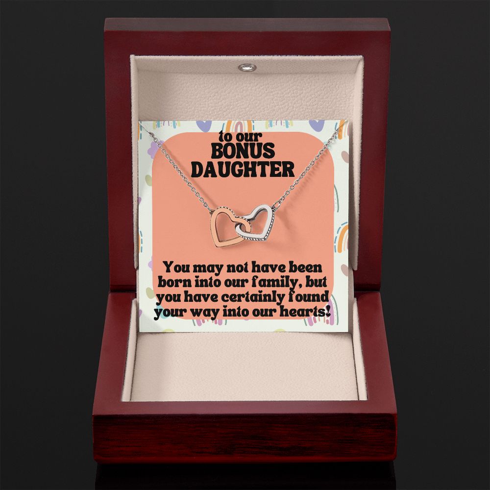 To our Bonus Daughter | You may not have been born into our family, but you have certainly found your way into our hearts! - Interlocking Hearts Necklace