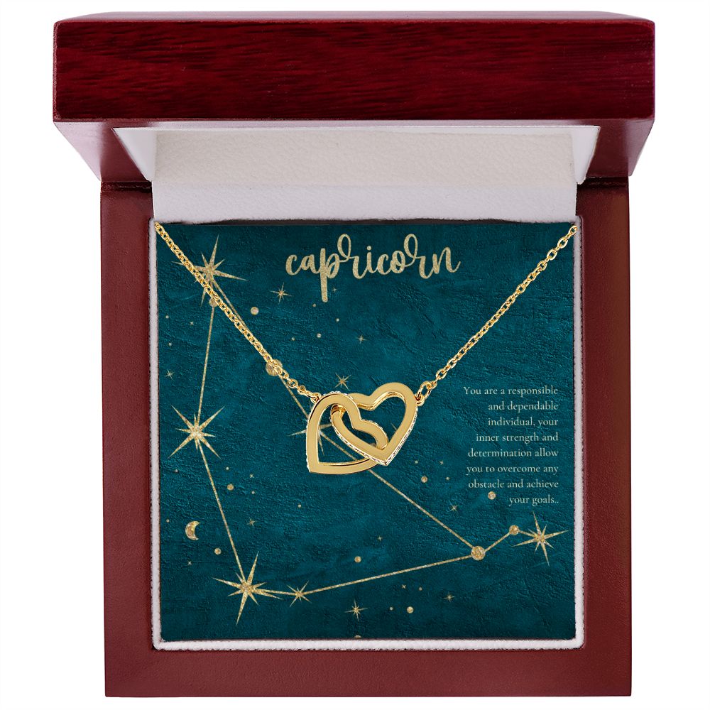 Capricorn | You are a responsible and dependable individual , your inner strenght and determination allow you to overcome any obstacle and achieve you goals. - Interlocking Hearts Necklace