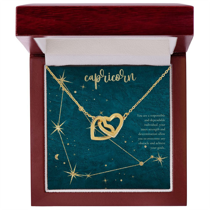 Capricorn | You are a responsible and dependable individual , your inner strenght and determination allow you to overcome any obstacle and achieve you goals. - Interlocking Hearts Necklace