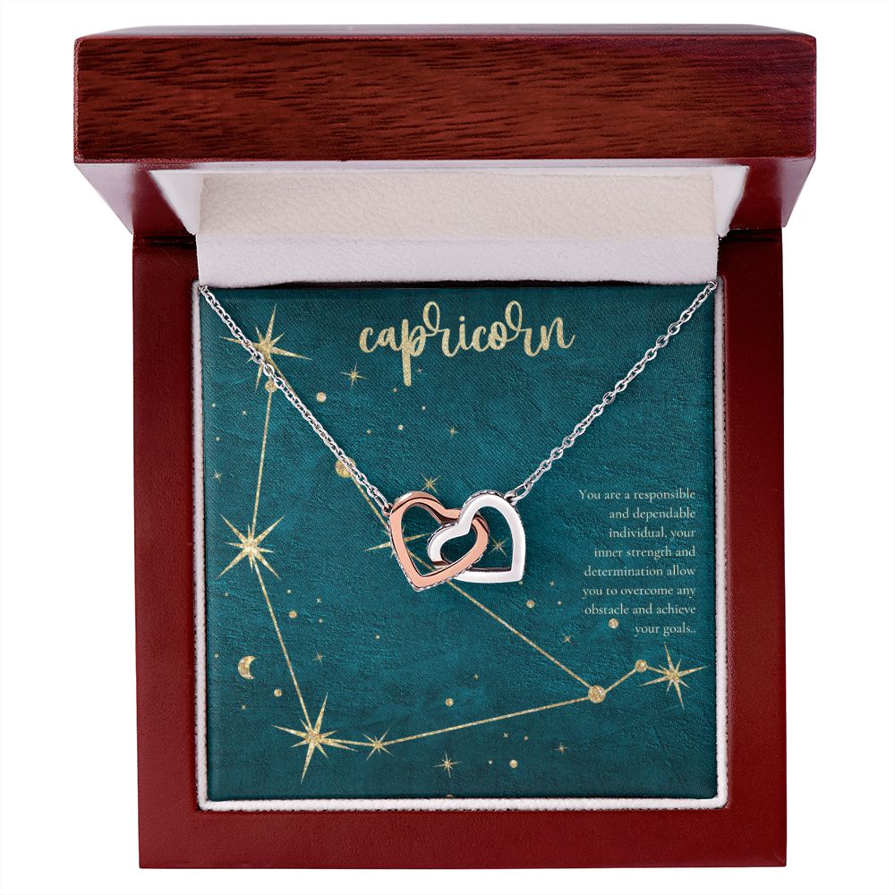 Capricorn | You are a responsible and dependable individual , your inner strenght and determination allow you to overcome any obstacle and achieve you goals. - Interlocking Hearts Necklace