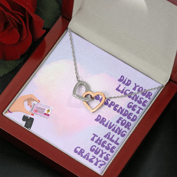 Did your license get suspended for driving all these guys crazy? - Interlocking Hearts Necklace