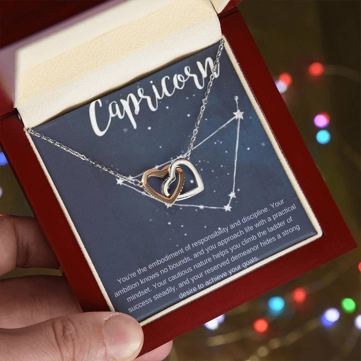 Capricorn | You're the embodiment of responsibility and discipline - Interlocking Hearts Necklace