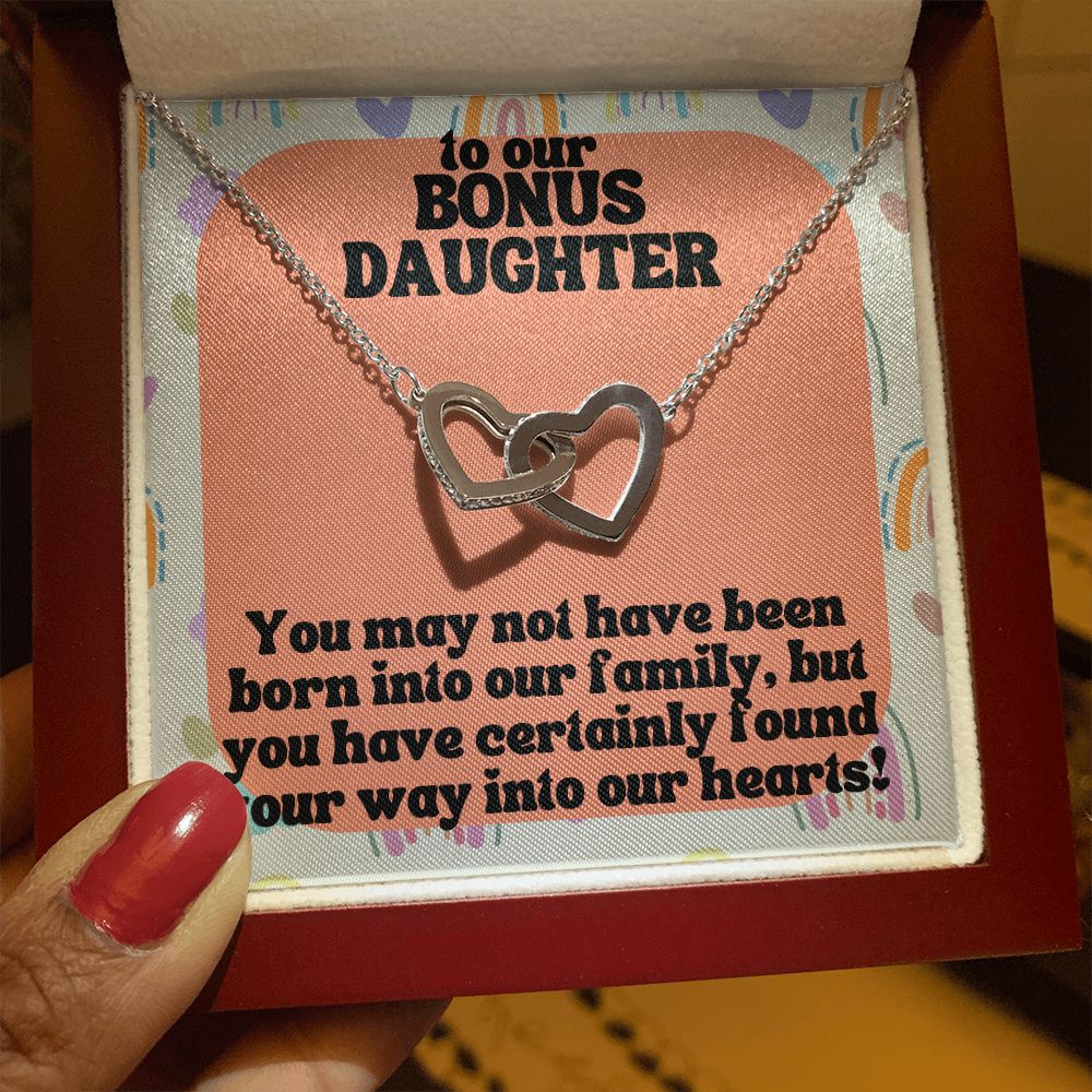 To our Bonus Daughter | You may not have been born into our family, but you have certainly found your way into our hearts! - Interlocking Hearts Necklace