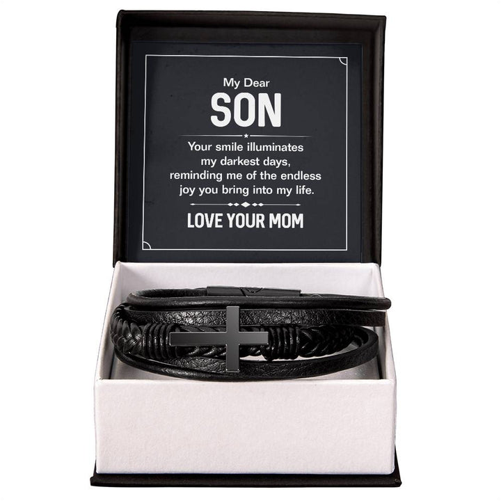 To My Dear Son | Your smile illuminates' my darkest shades - Men's Cross Leather Bracelet