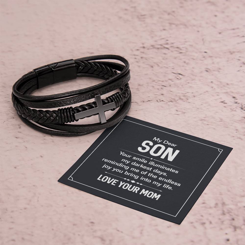 To My Dear Son | Your smile illuminates' my darkest shades - Men's Cross Leather Bracelet