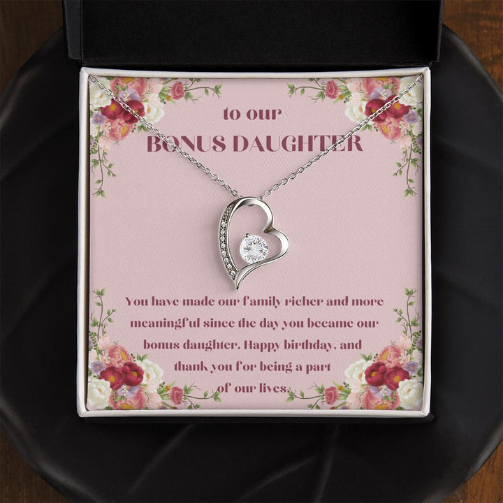 To our Bonus Daughter | You have made our family richer and more meaningful since the day you became our bonus daughter, Happy Birthday! - Forever Love Necklace