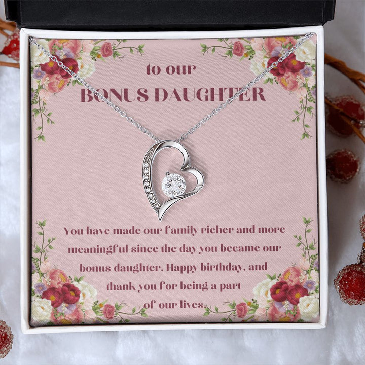 To our Bonus Daughter | You have made our family richer and more meaningful since the day you became our bonus daughter, Happy Birthday! - Forever Love Necklace