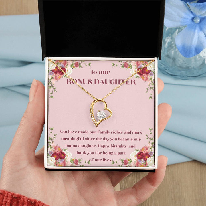 To our Bonus Daughter | You have made our family richer and more meaningful since the day you became our bonus daughter, Happy Birthday! - Forever Love Necklace