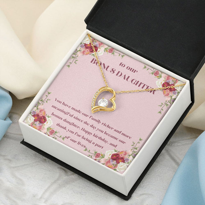 To our Bonus Daughter | You have made our family richer and more meaningful since the day you became our bonus daughter, Happy Birthday! - Forever Love Necklace