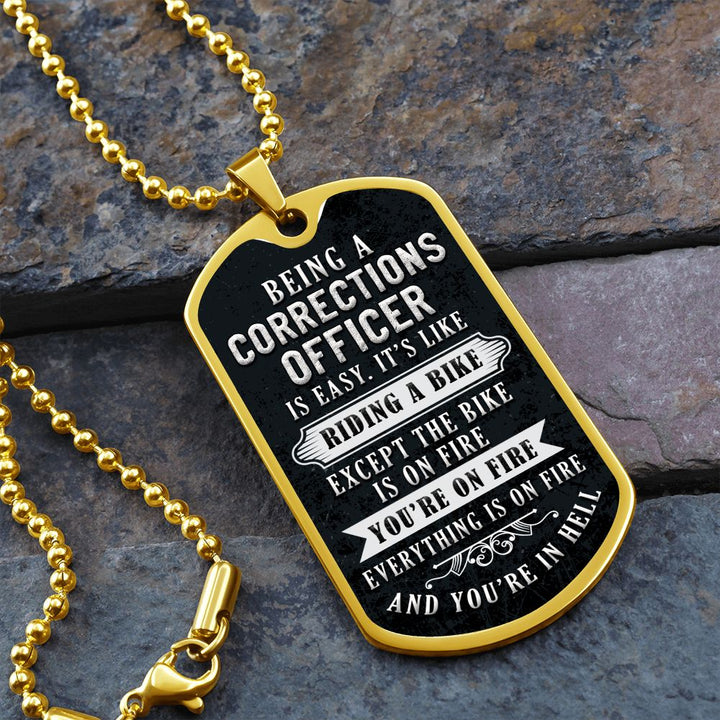 Being a corrections officer is easy, It's like riding a bike - Dog Tag